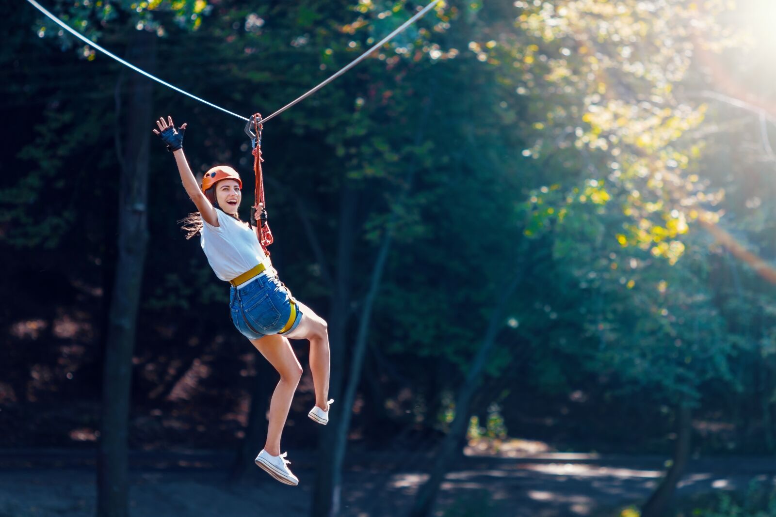 Woman having fun on zipline.