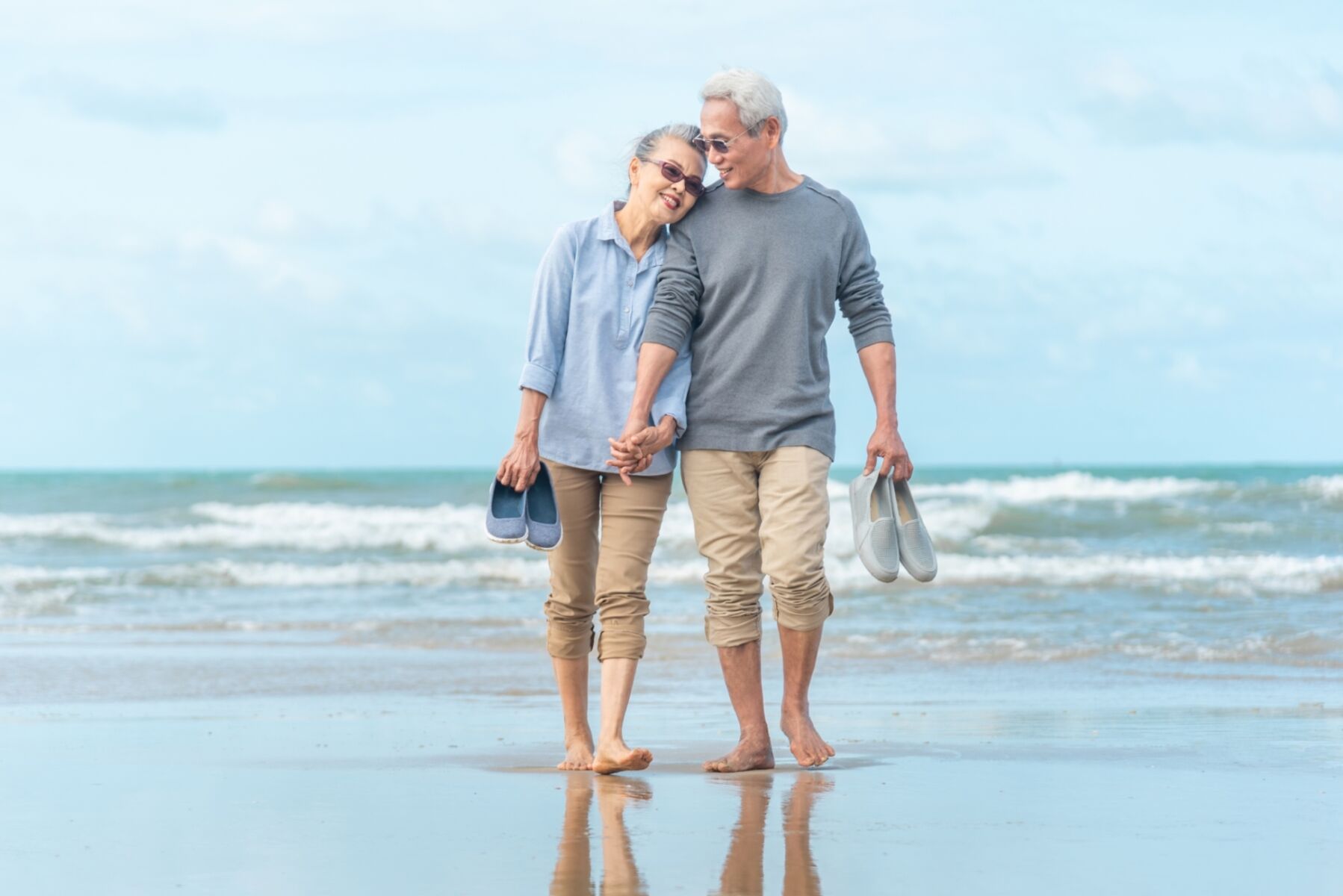 couple on beach in winter