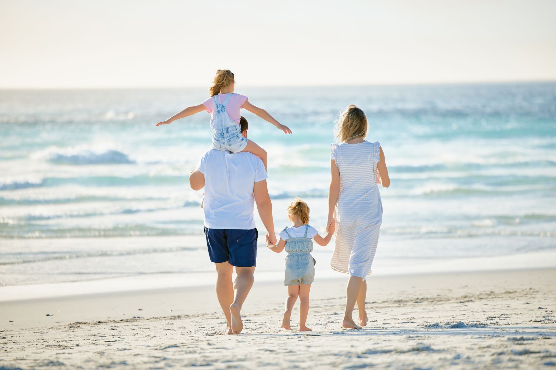 family walking on beach